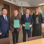 COOPERATION AGREEMENT BETWEEN EMU AND NUM